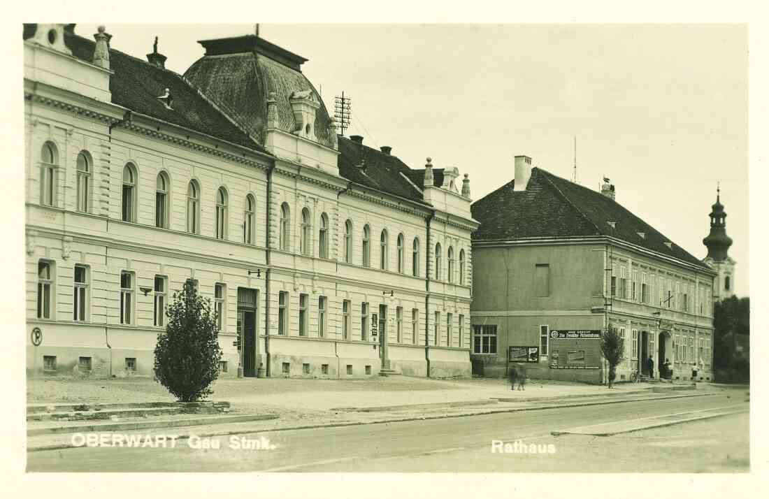Ansichtskarte: Rathaus und Paganyhaus (Hauptplatz 11) mit einem Storch am Rauchfang